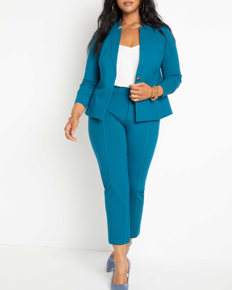 Front of a model wearing a size 14 Regular The Ultimate Stretch Suit Pintuck Pant in Moroccan Blue by ELOQUII. | dia_product_style_image_id:315323